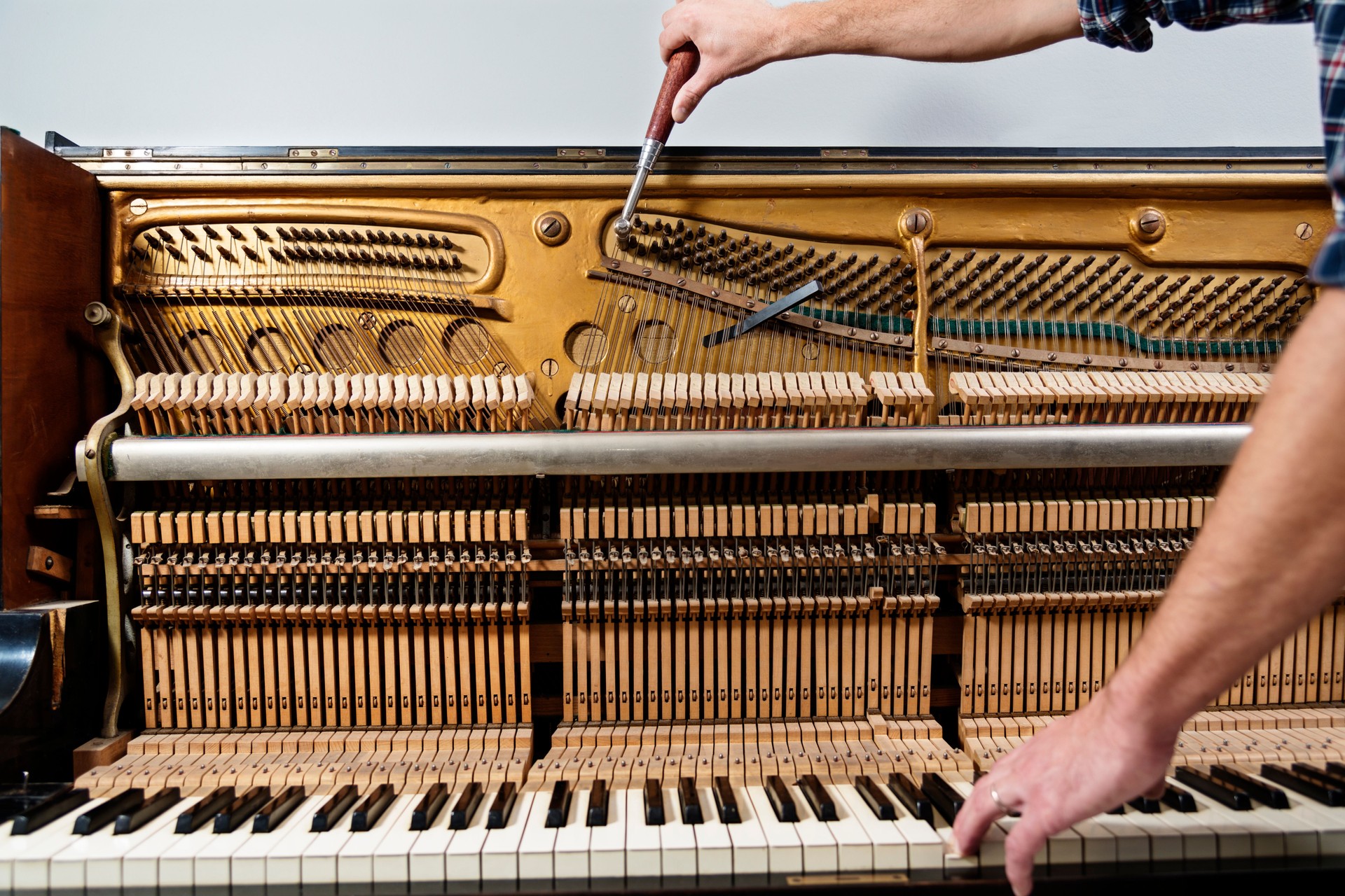 Piano Tuner at Work